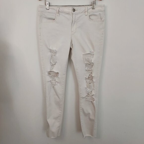 American Eagle Mid Rise Super Distressed Cream Jeggings - Picture 1 of 13